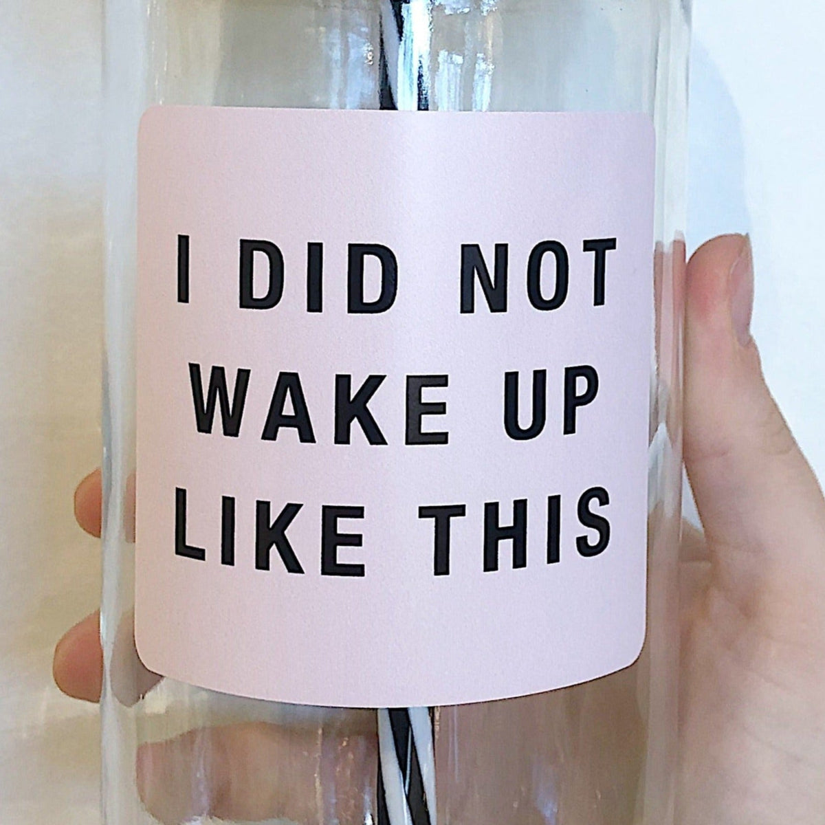 Close up of a mason jar tumbler that says "I did not wake up like this”