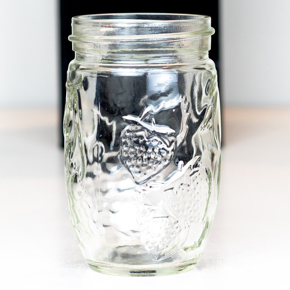 10 oz regular mouth mason jar with a unique tall and thin bulb shape, on a white background