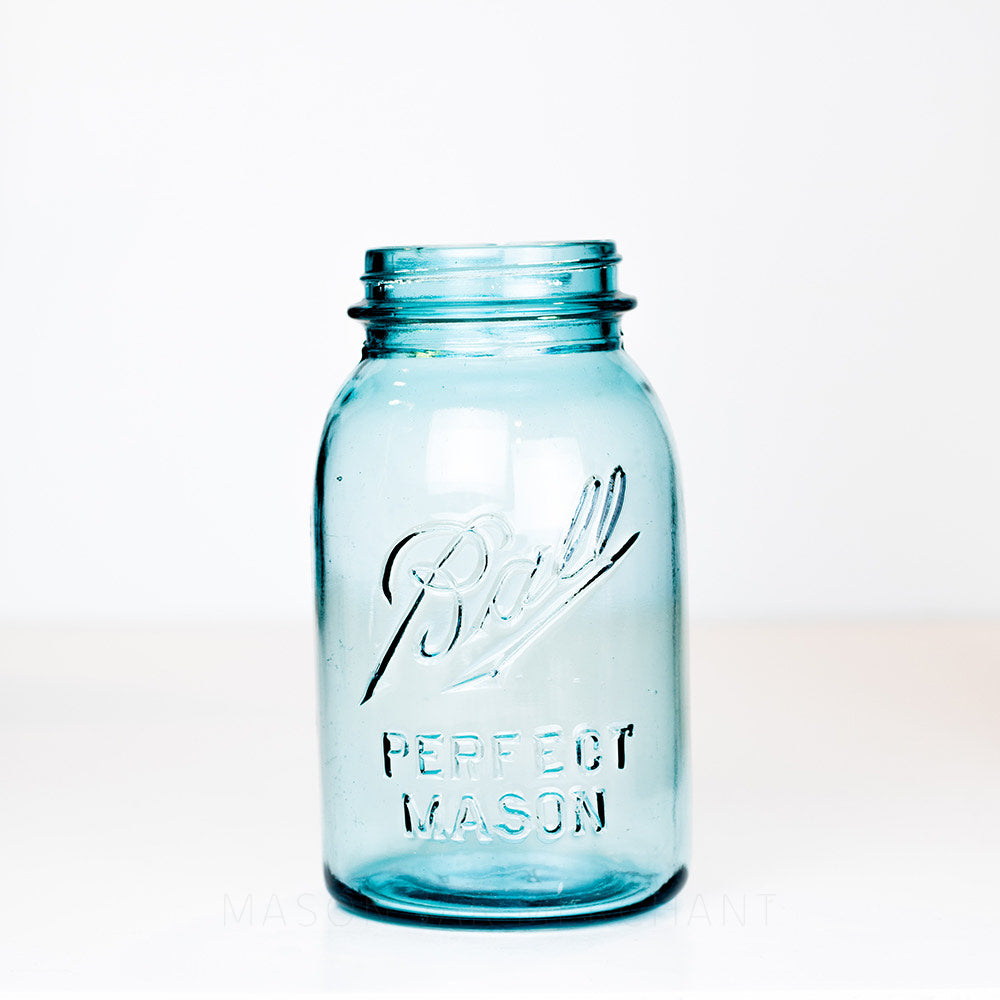 Vintage blue Ball Perfect Mason regular mouth quart jar on a white background