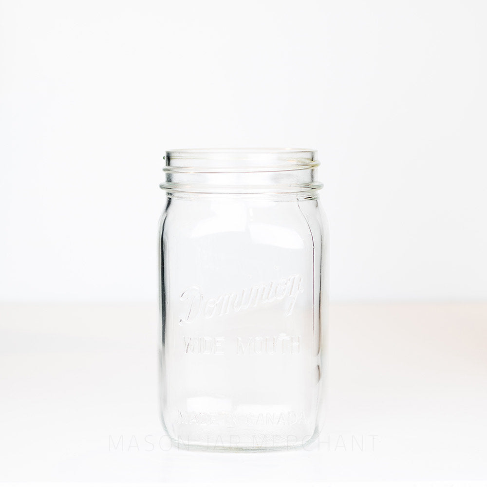 Wide mouth quart mason jar with Dominion Wide Mouth logo on a white background