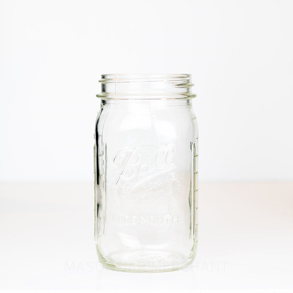 Wide mouth quart mason jar with Ball logo on a white background