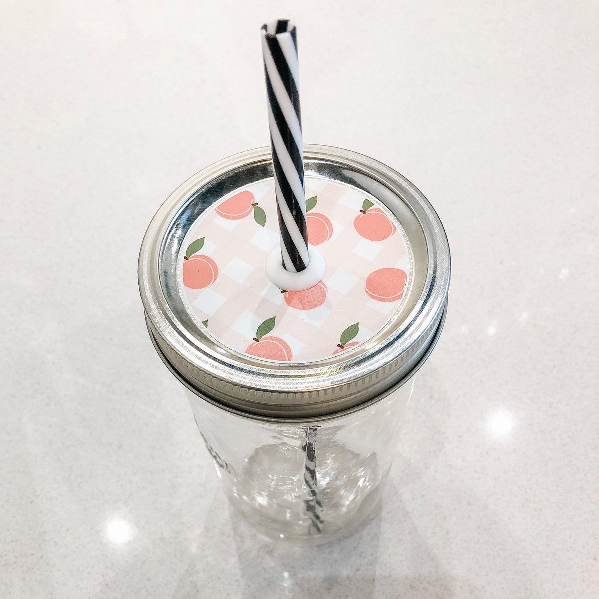 Photo of a peach fest mason jar straw lid
