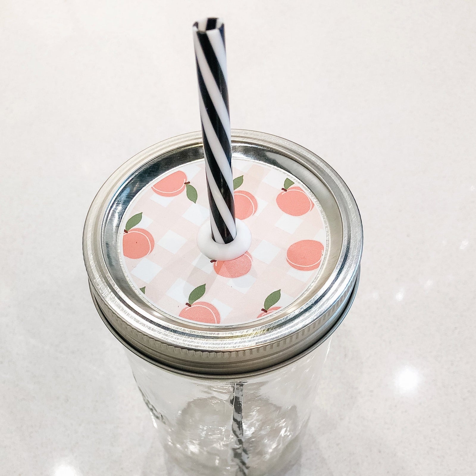 Photo of a peach fest mason jar straw lid