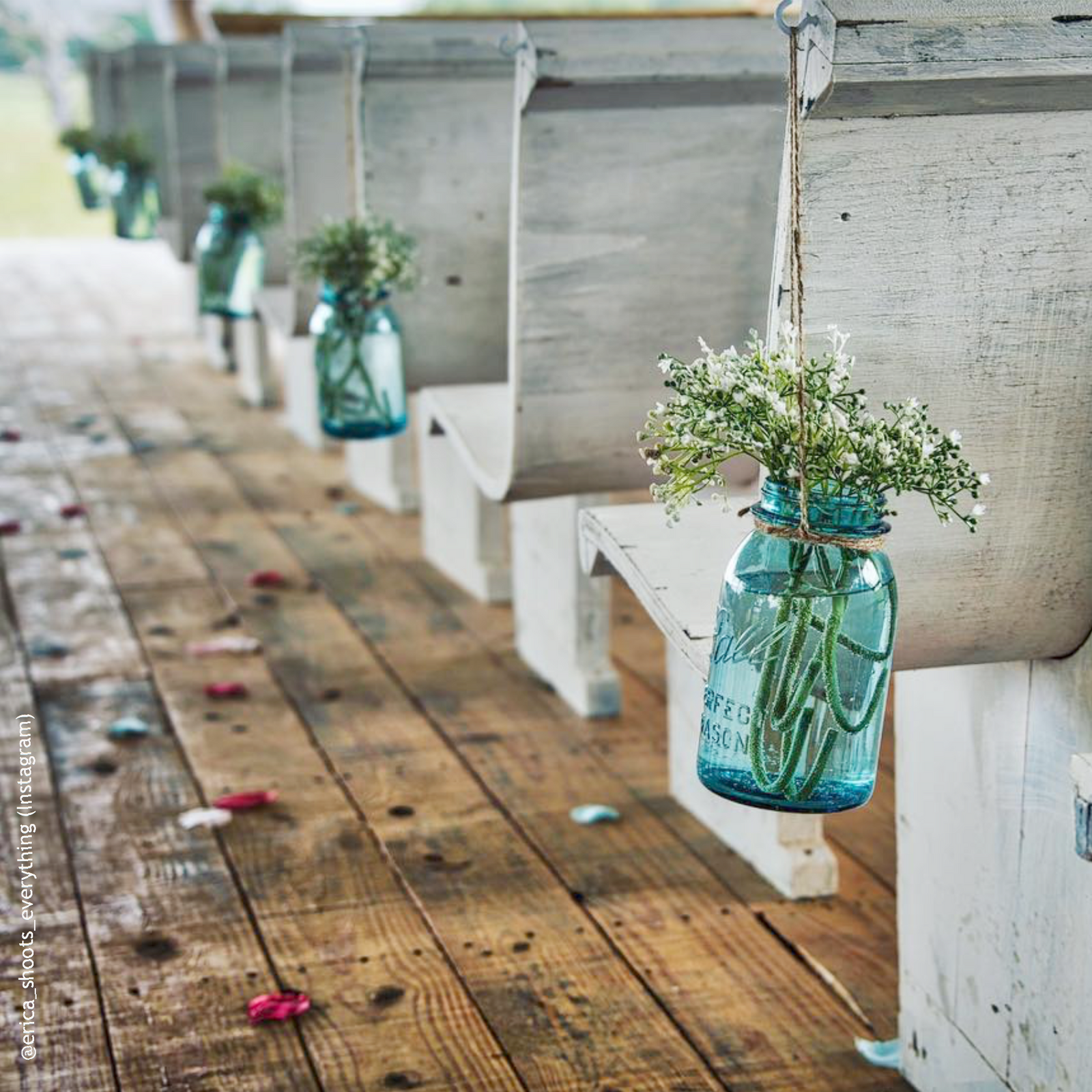 Vintage blue Ball regular mouth quart mason jar against a white background