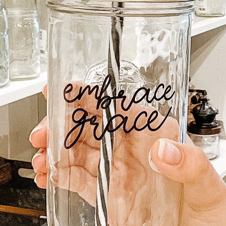 Photo of mason jar tumbler with a "Embrace grace" text
