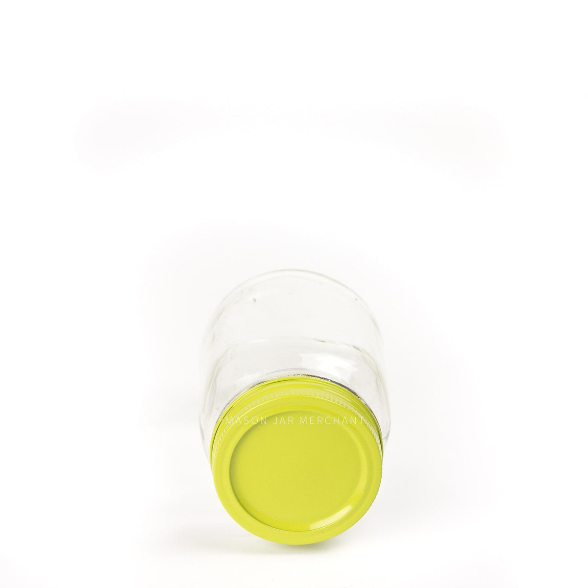 A lime green painted lid on a regular mouth jar