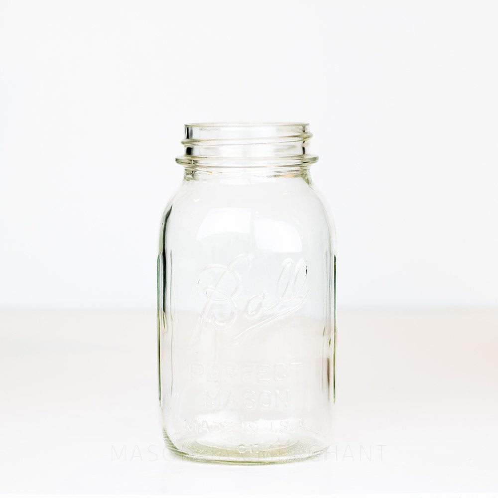 Ball regular mouth quart mason jar with logo showing on a white background