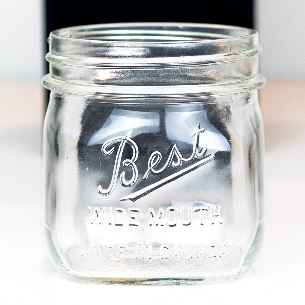 A close up of Wide mouth pint mason jar with Best wide mouth logo, against a white background