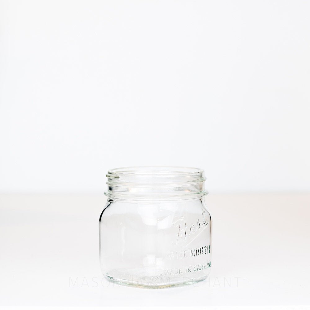 A side view of a Wide mouth pint mason jar with Best wide mouth logo, against a white background