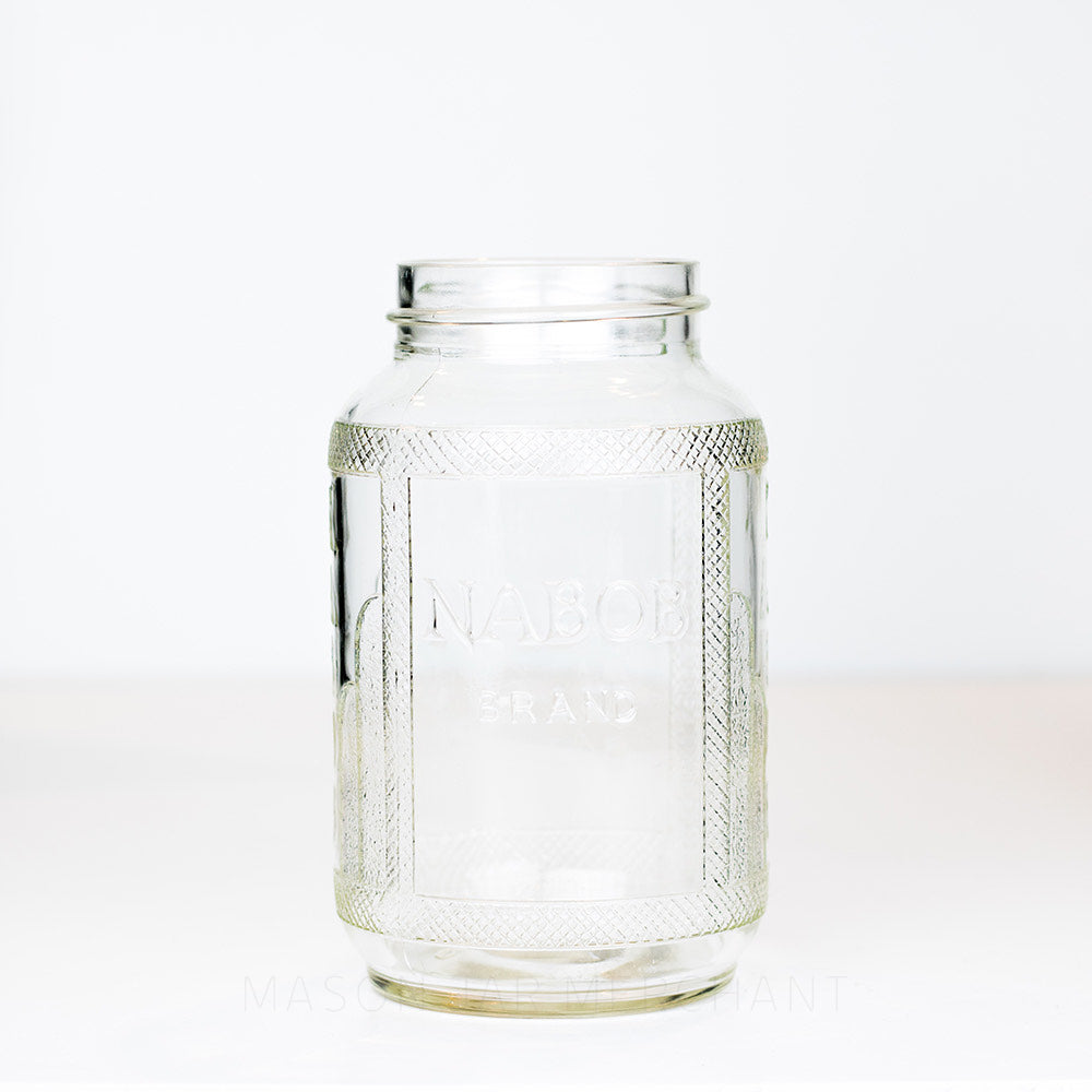 Unique gem mouth 1.2 litre mason jar with Nabob Brand logo and decorate details, on a white background