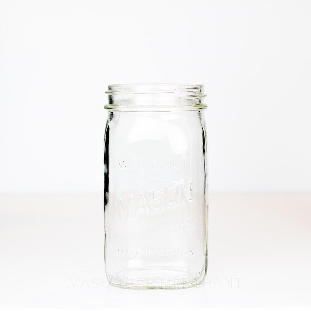 Wide mouth quart mason jar with Mason logo against a white background