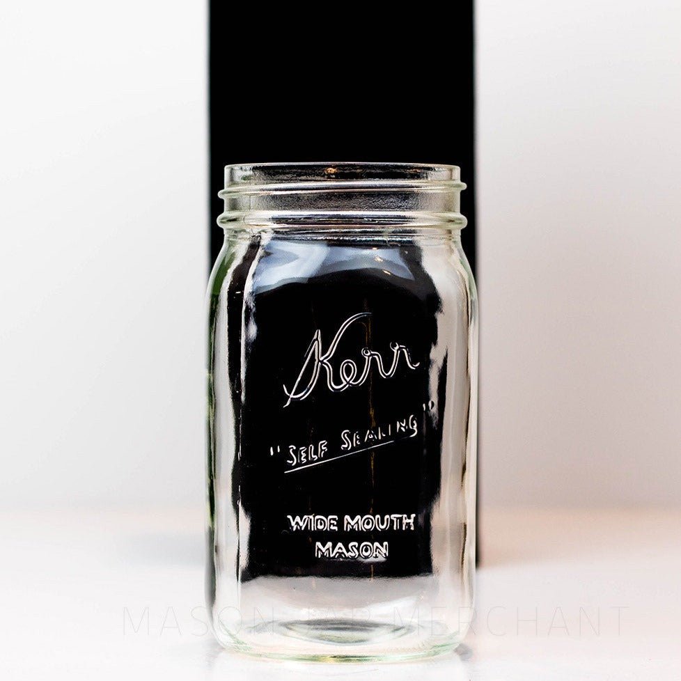 wide mouth quart mason jar with Kerr self-sealing logo against a white background