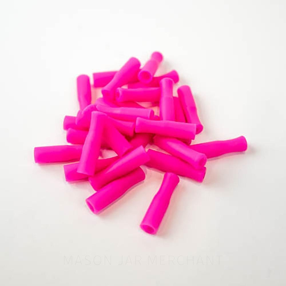 Hot pink silicone straw tips for stainless steel straws, set against a white background.