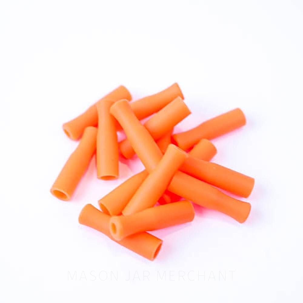 Orange silicone straw tips for stainless steel straws, set against a white background.