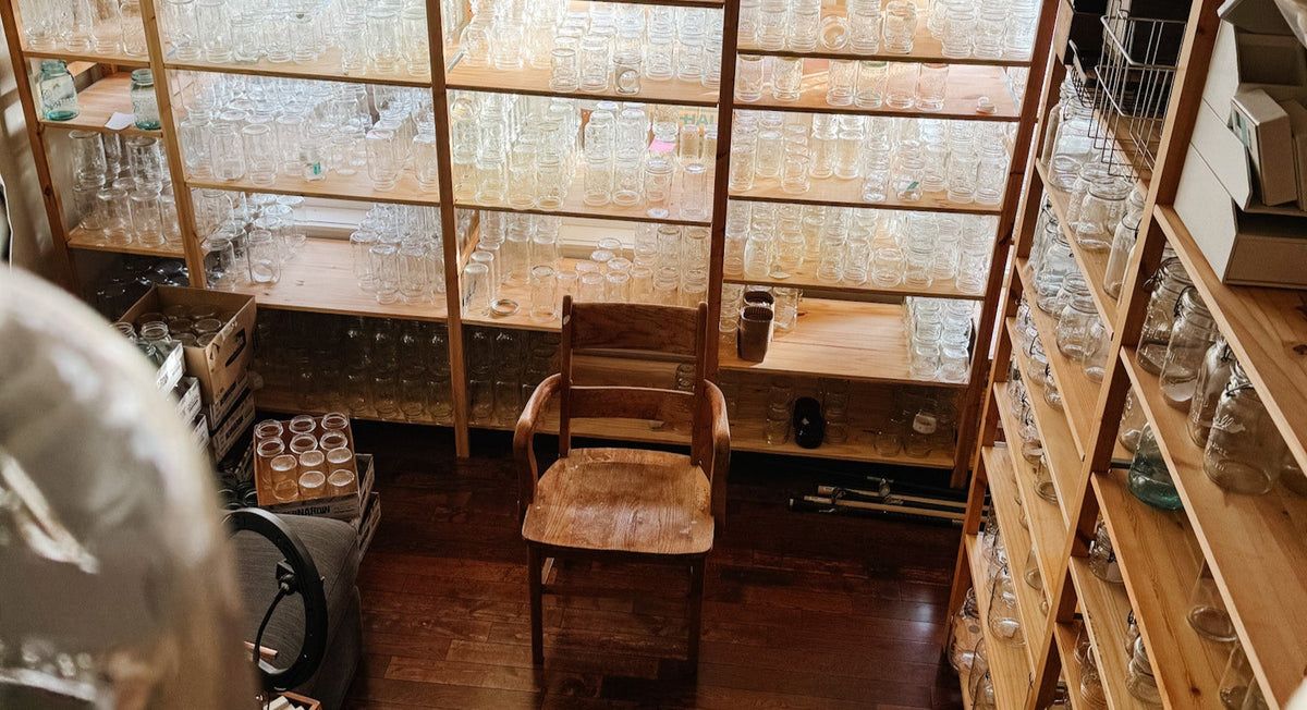 Shelves of vintage mason jars in the Mason Jar Merchant shop