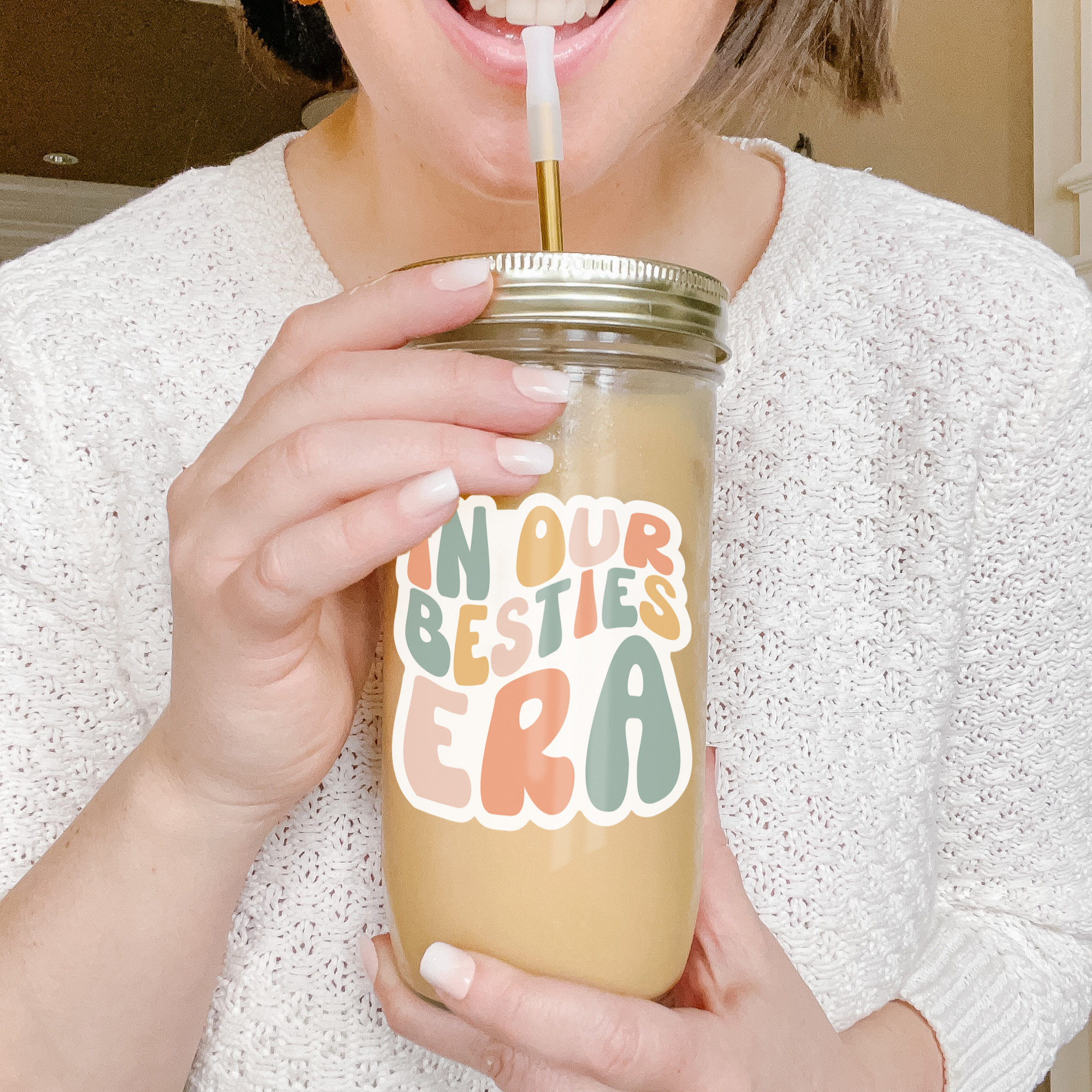 Girl holding a tumbler with an example of our Retro Era Custom tumbler