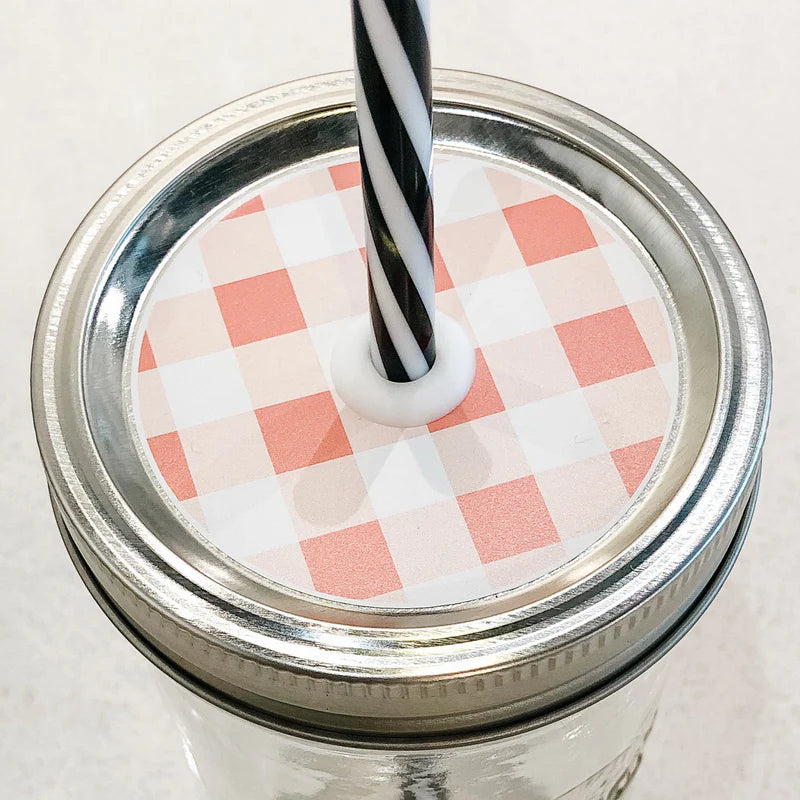 Picture shows peach and white gingham design on mason jar patterned straw lid 