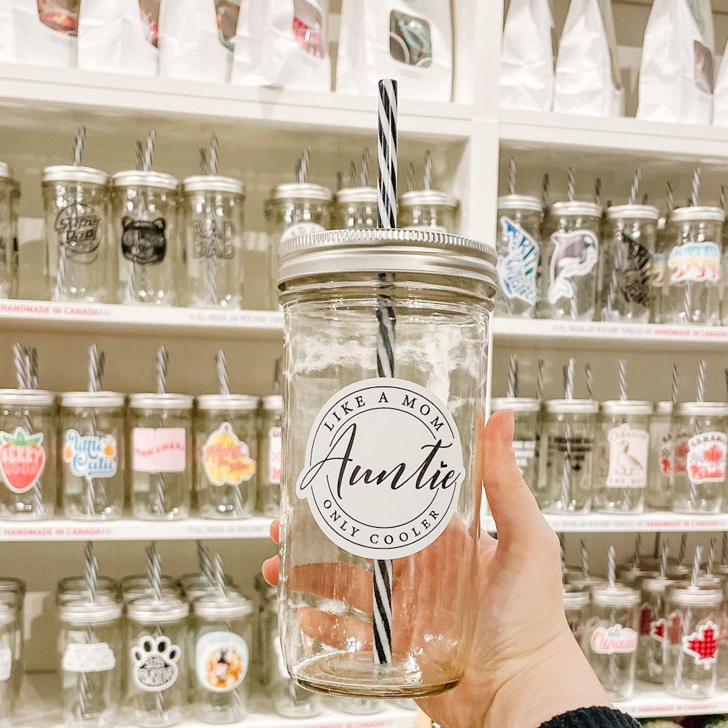 Hans holding mason jar tumbler that reads like a mom, auntie, only cooler 