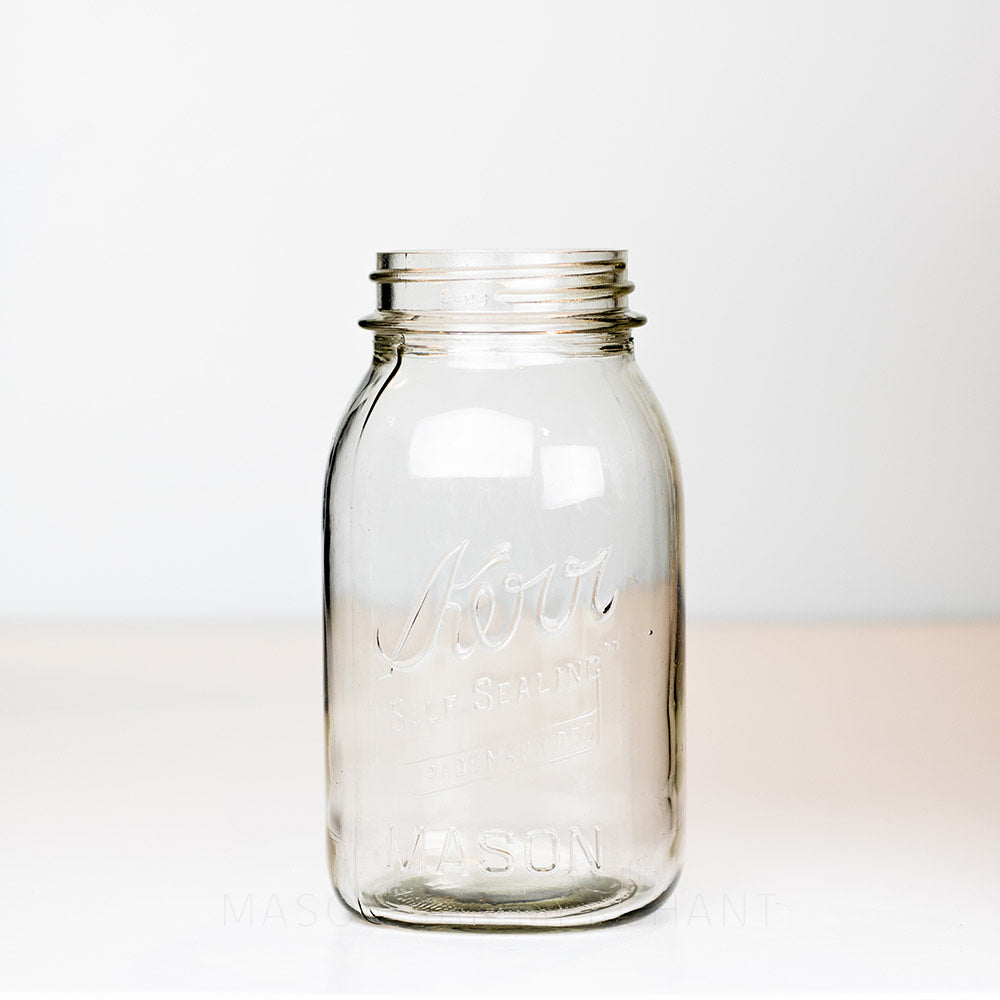Vintage Kerr Regular Mouth Quart Jar on White Background. Reads Kerr "Self Sealing" [TRADE MARK REC].