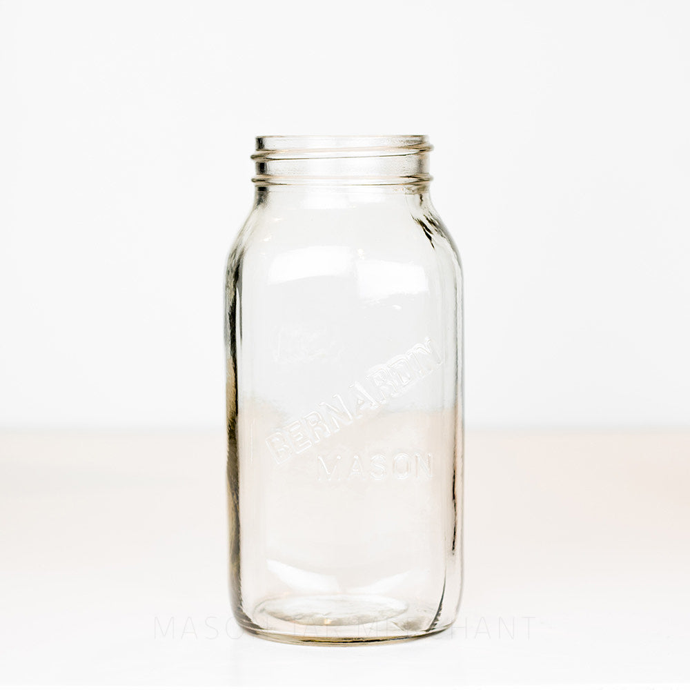 Regular mouth quart mason jar with Bernardin mason logo, on a white background