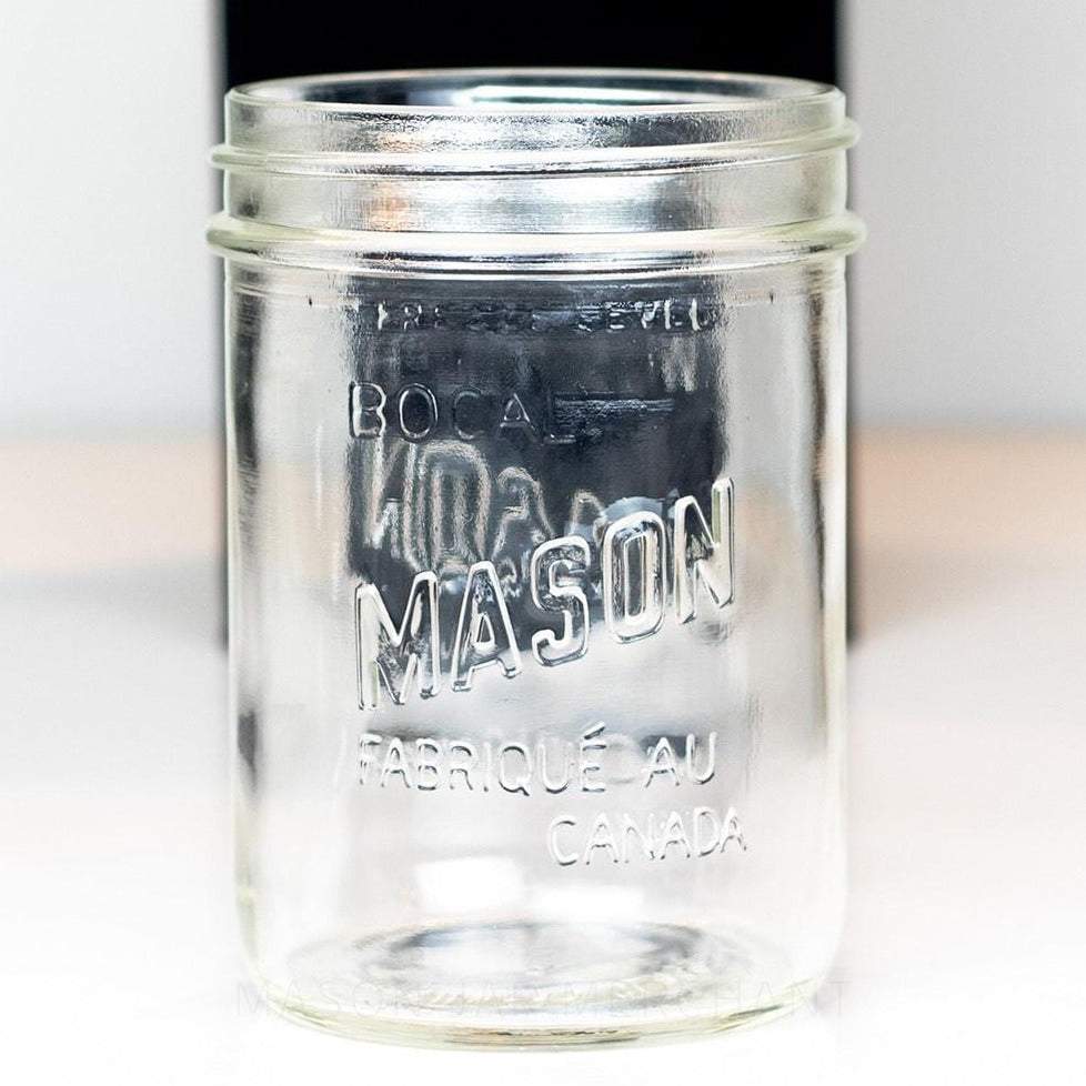 Canadian mason wide mouth pint jar against a white background