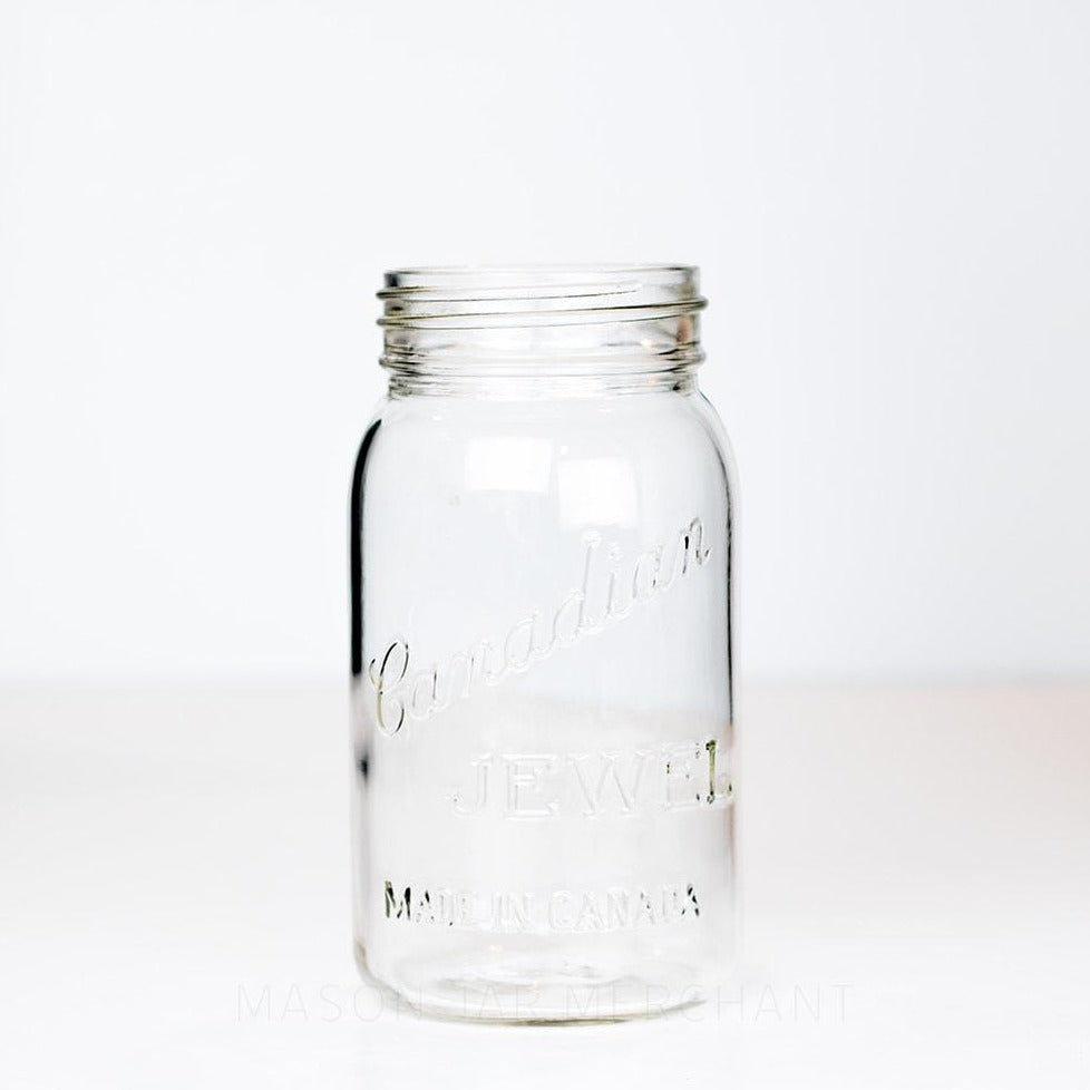 Very old Vintage Canadian Jewel 'Made In Canada' Gem Mouth Quart. Has a single triangle marking on the bottom of the jar, photographed on a white background.