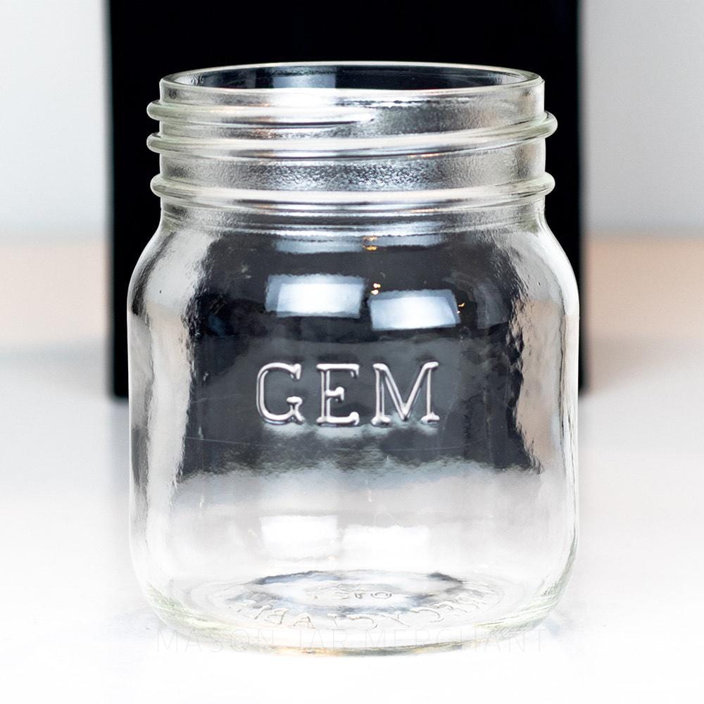Adorable gem mouth 13 oz mason jar with GEM logo, on a white background