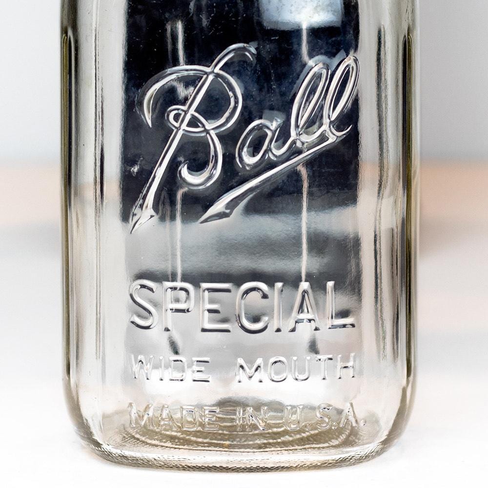 Wide mouth quart mason jar with Ball Special logo, on a white background