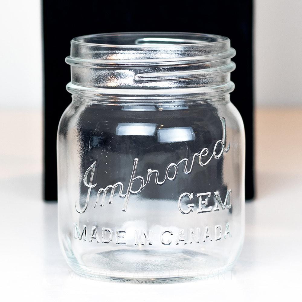 Adorable gem mouth 13 oz mason jar with Improved Gem logo on a white background