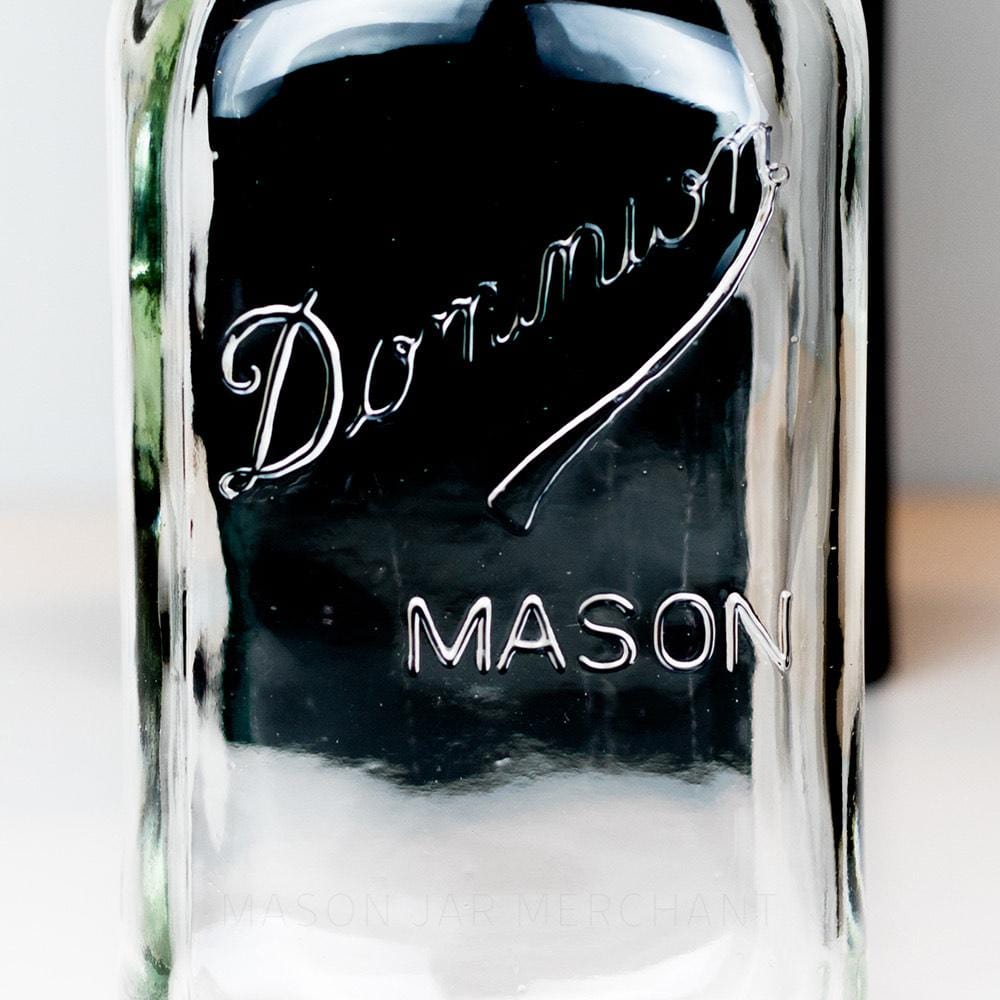 Regular mouth quart mason jar with Dominion Mason logo against a white background
