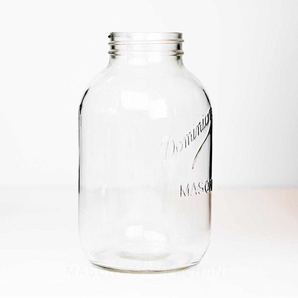 Vintage regular mouth two-liter jar with Dominion logo against a white background.