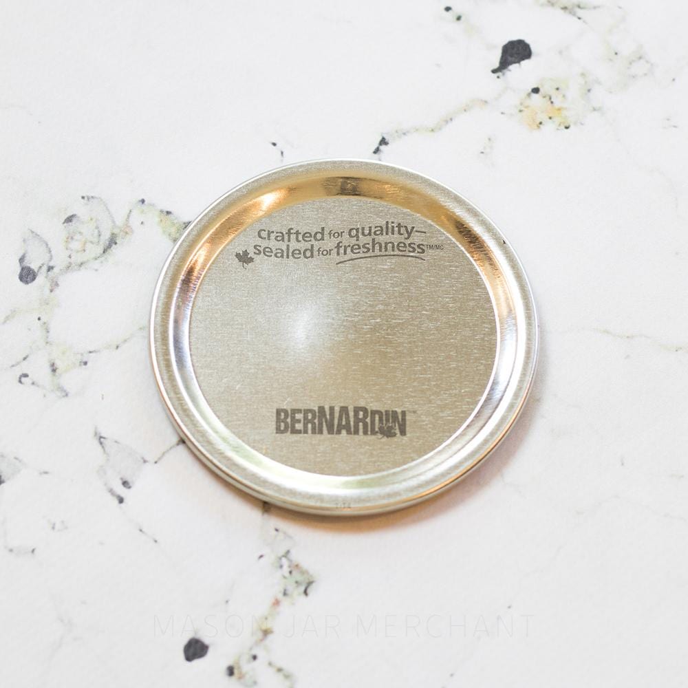 close up of a silver wide mouth Bernardin canning lid
