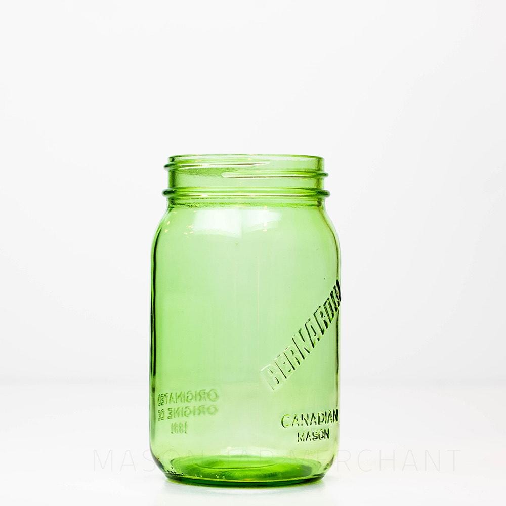 Green Bernardin wide mouth quart mason jar against a white background