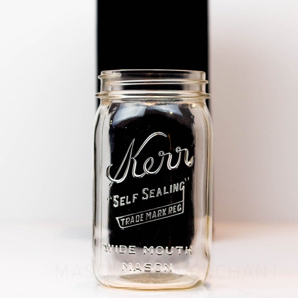 Wide mouth quart mason jar with Kerr self-sealing logo, against a white background