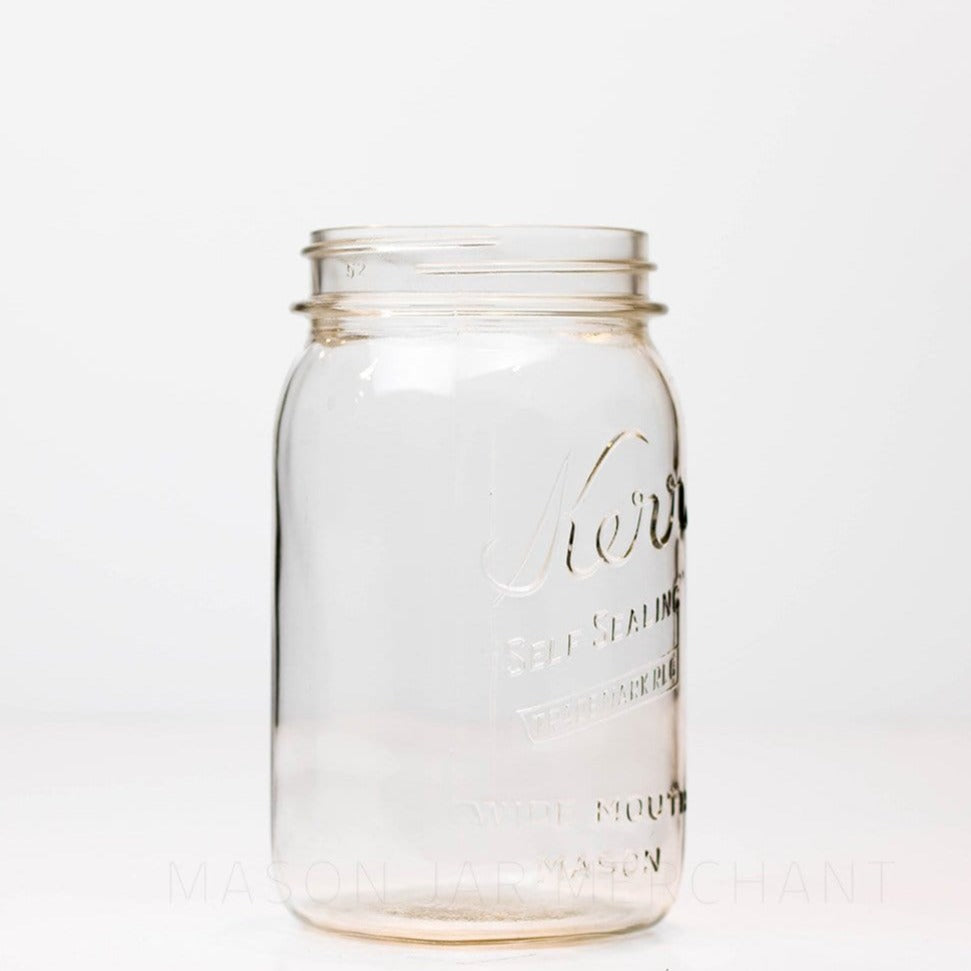 Wide mouth quart mason jar with Kerr self-sealing logo, against a white background