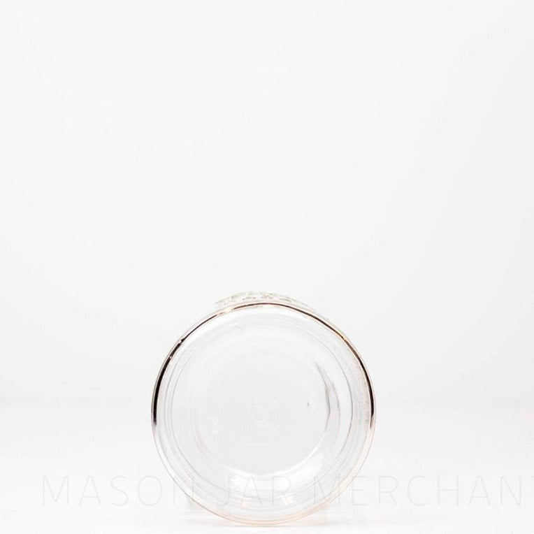 Vintage Improved Gem quart mason jar against a white background