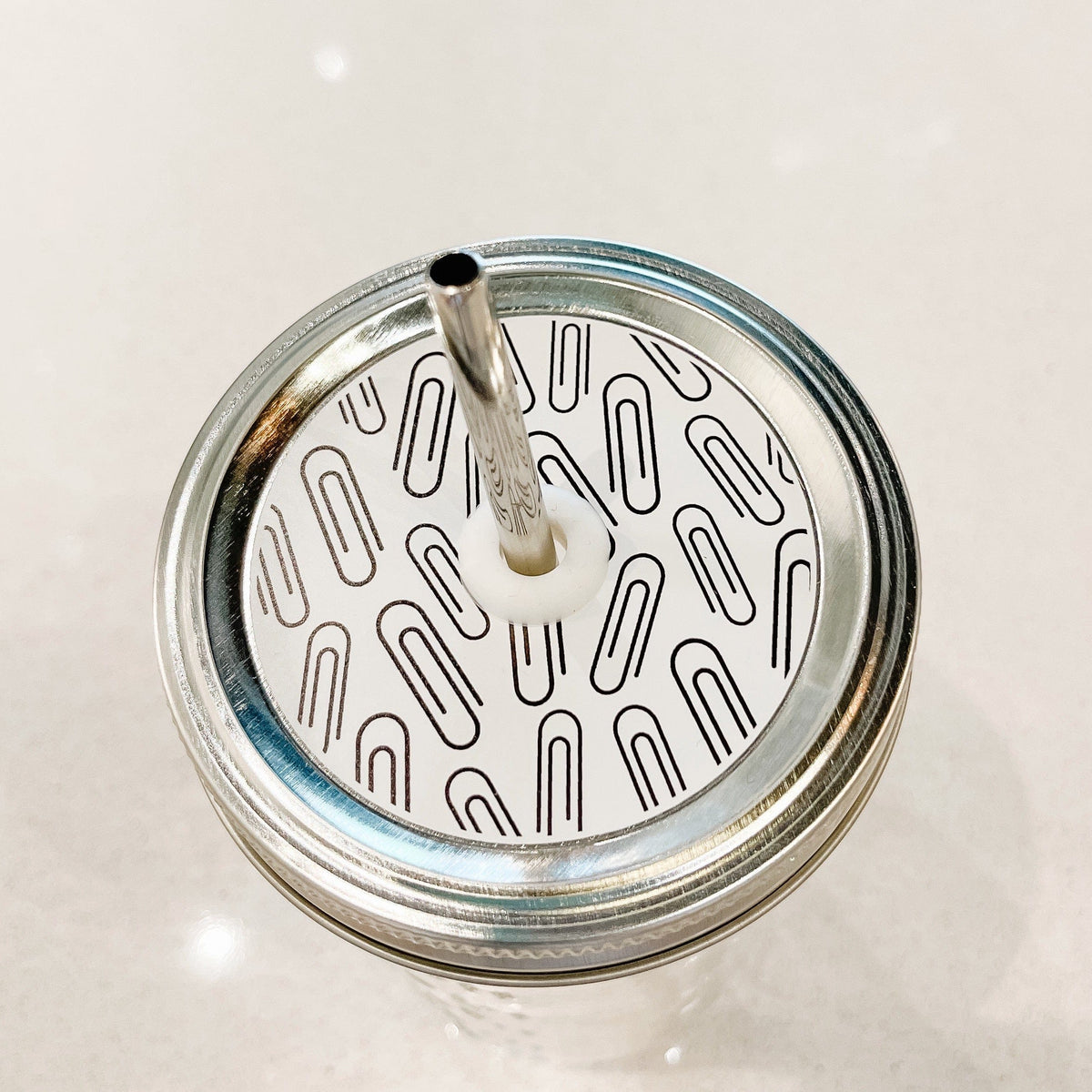 Paper Clips on White Mason Jar Straw Lid