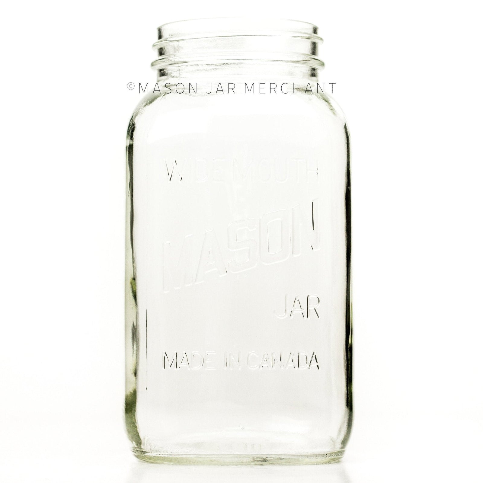 Wide mouth half-gallon mason jar with Mason logo, against a white background