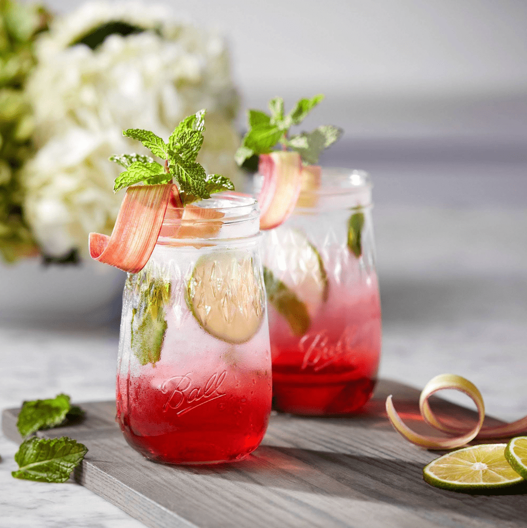 Photo of a ball flute regular mouth mason jar with a pink margarita inside