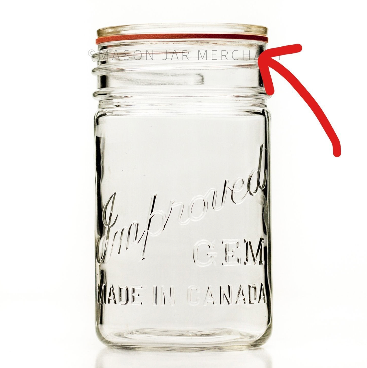 four red GEM mouth rubber seals for mason jars on a white background
