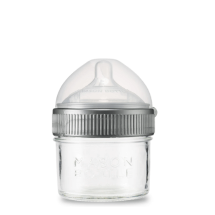 Close up frontal photo of 4oz mason bottle with nipple and cap. Photographed against white background.