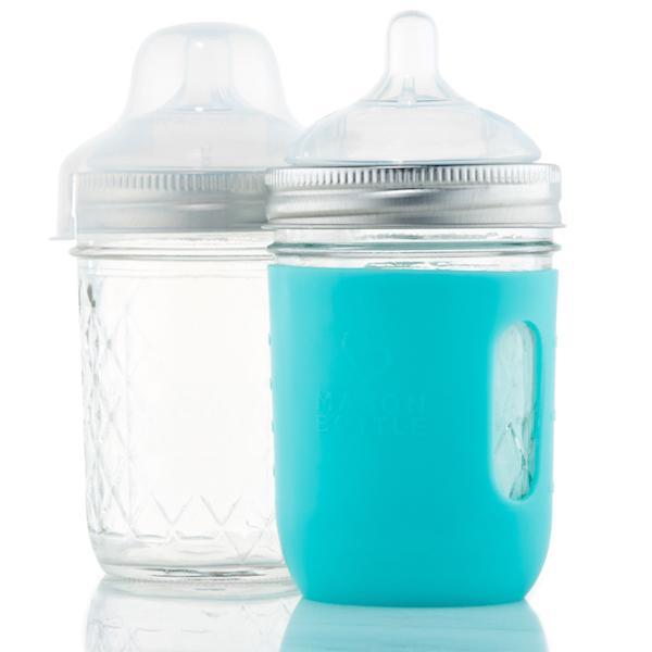 One mason jar equipped with silicone nipple and the other mason jar is covered with a blue sleeve.
