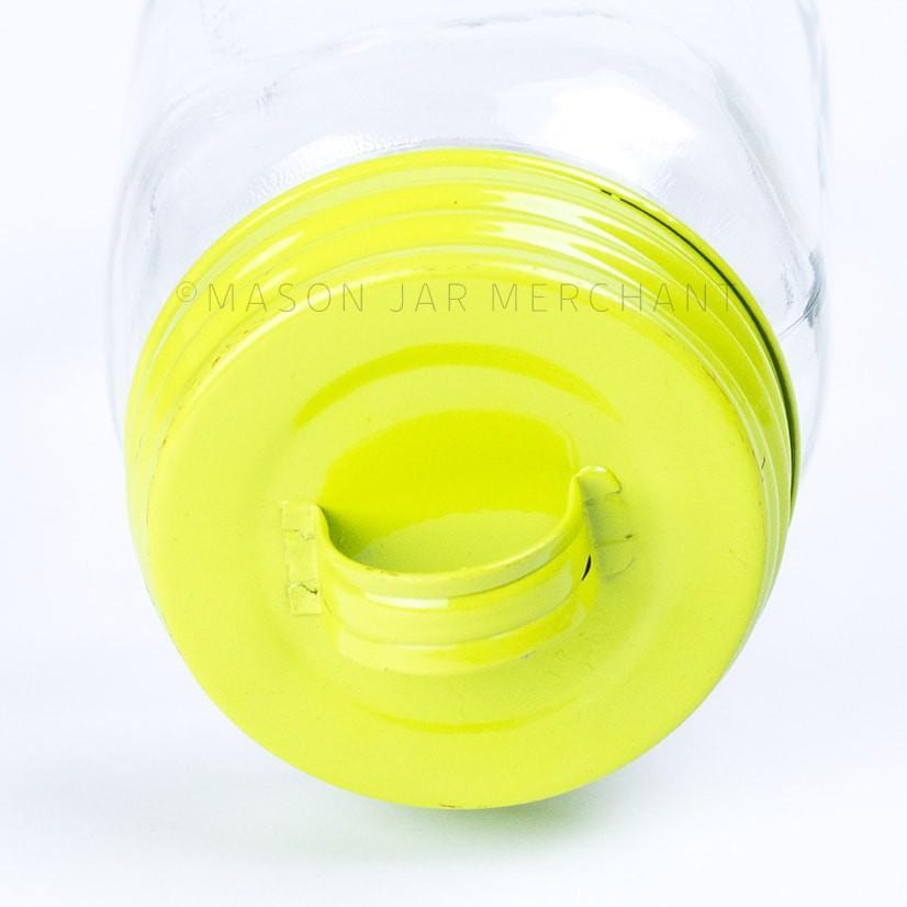 Chartreuse vintage look enamel mason jar lid shown on a white background.