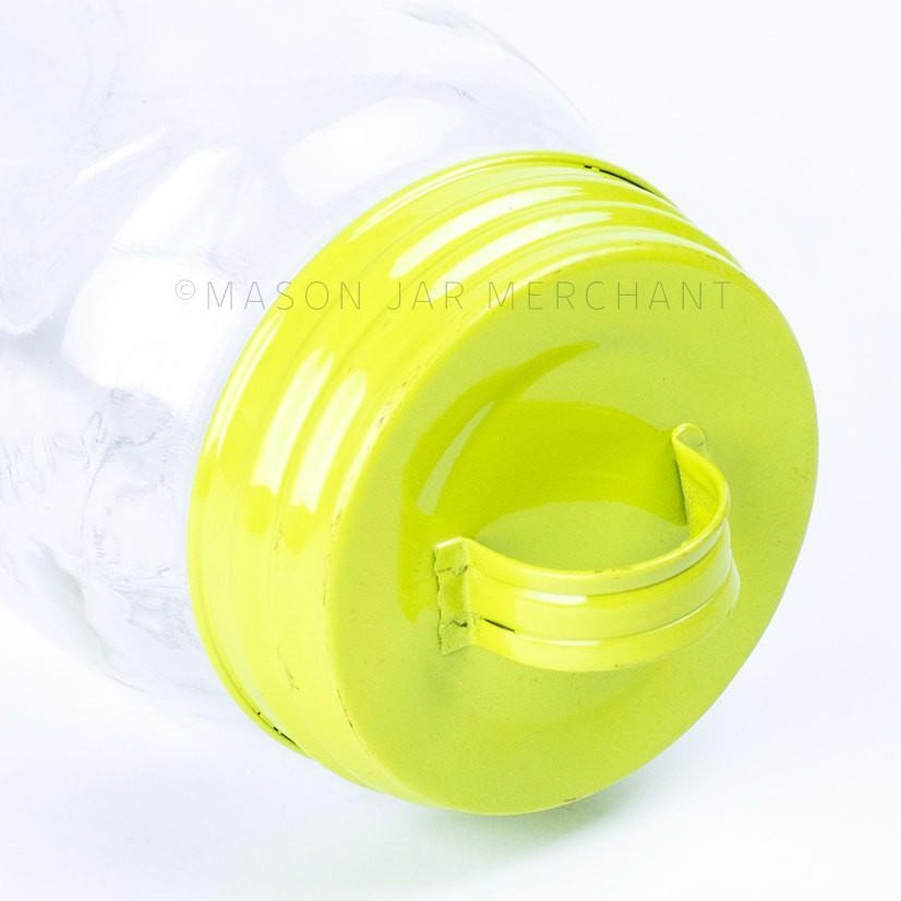 Chartreuse vintage look enamel mason jar lid shown on a white background.