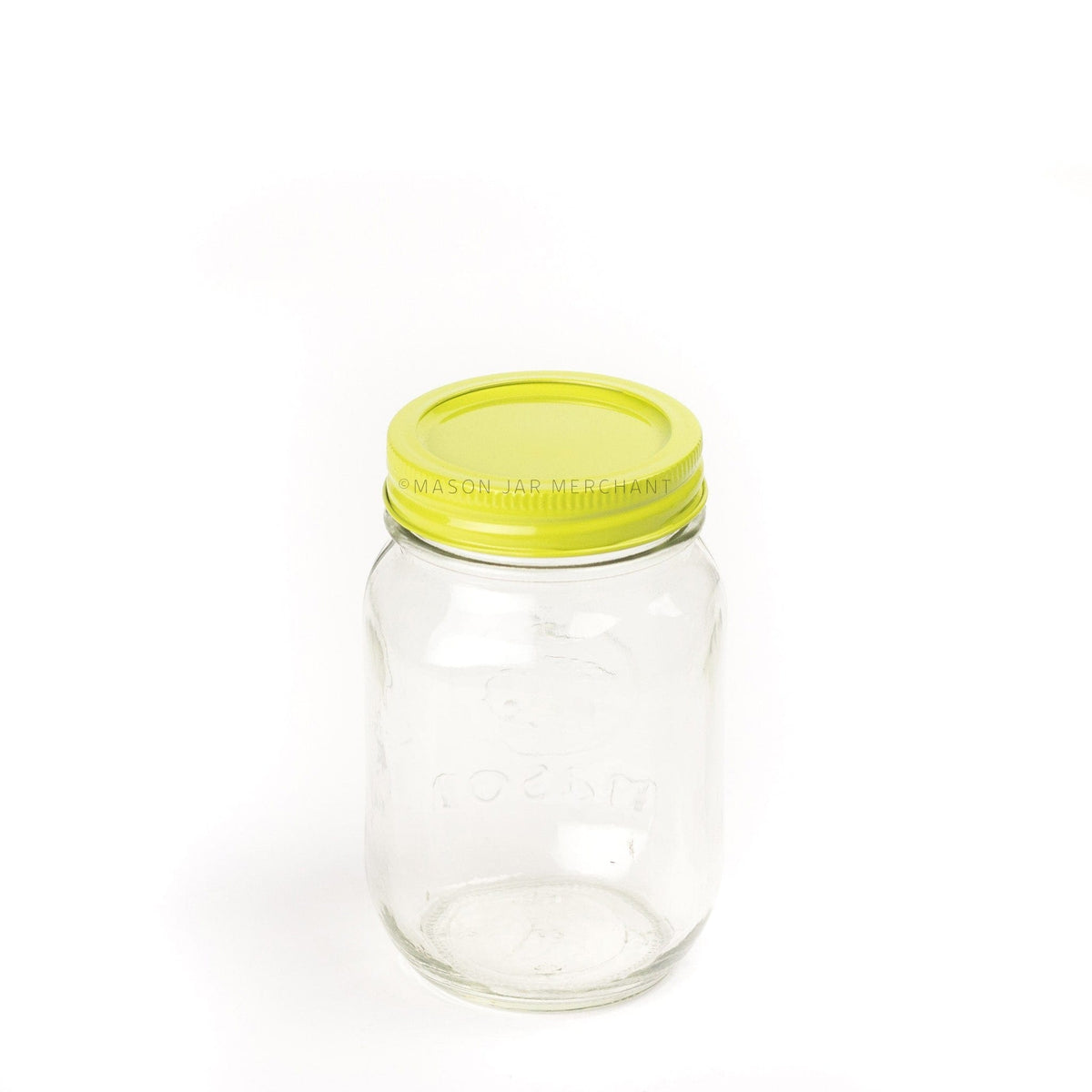 A lime green painted lid on a regular mouth jar