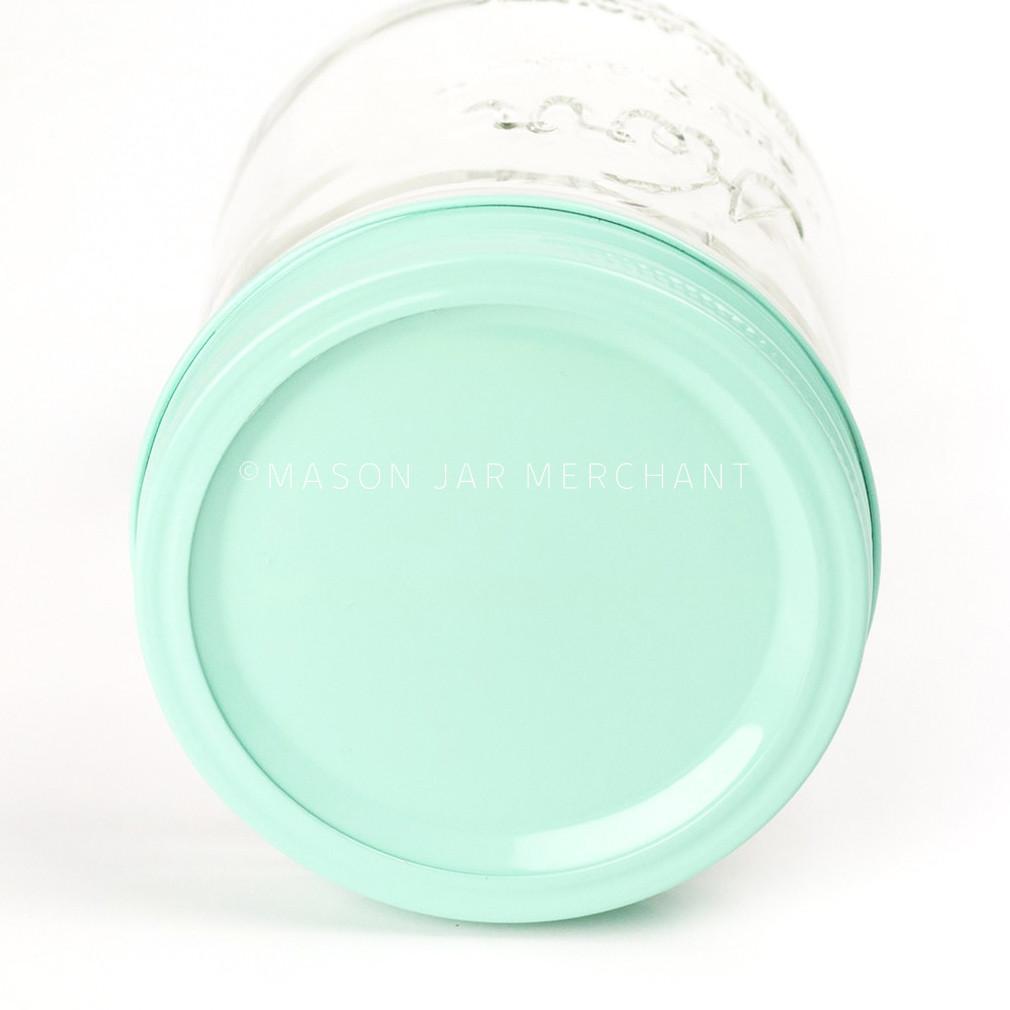 24 oz reusable glass mason jar tumbler with a light aqua mason jar lid and ring