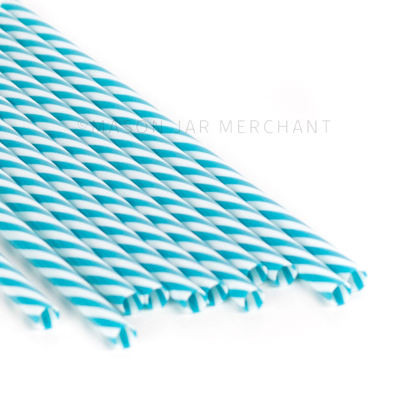 Dark teal and white striped BPA-free reusable plastic straws against a white background