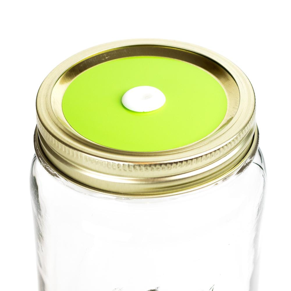 Photo of a mason jar with a straw lid with a colored decal. Photographed against a white background.