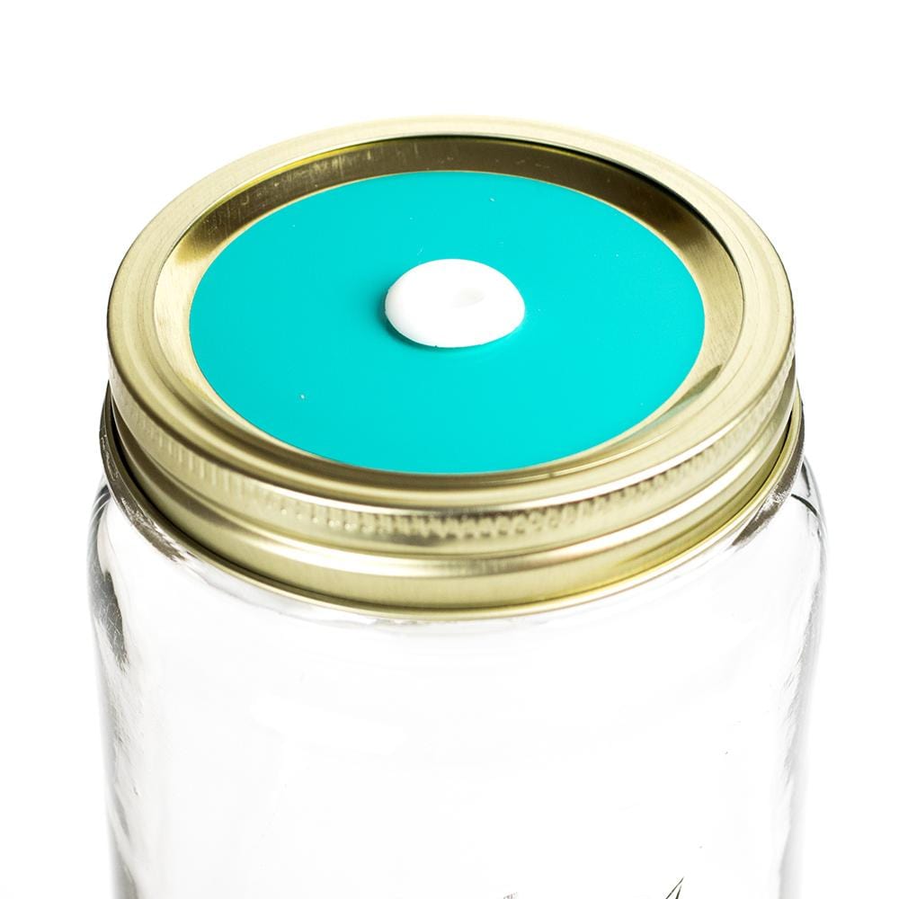 Photo of a mason jar with a straw lid with a colored decal. Photographed against a white background.