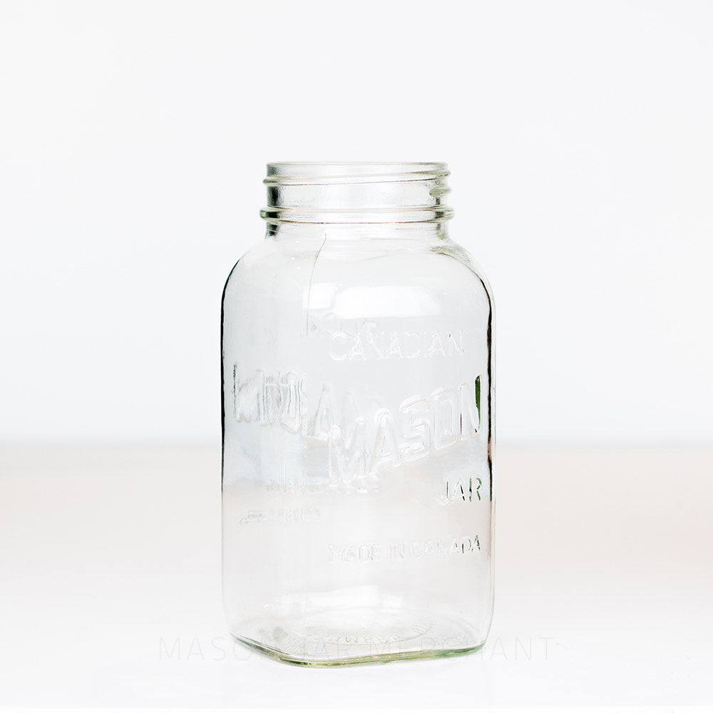 Regular mouth quart mason jar with Canadian Mason Jar logo, against a white background 